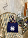 Alice Bookshop Tote Bag